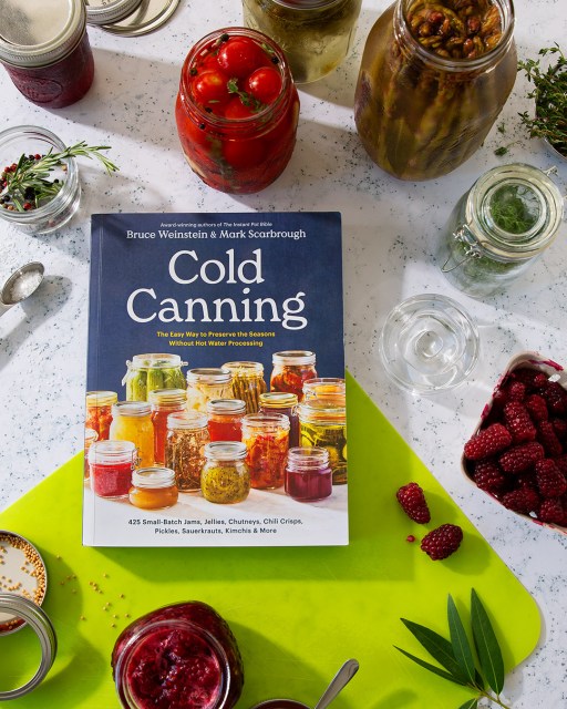 Cold Canning book on counter with jars